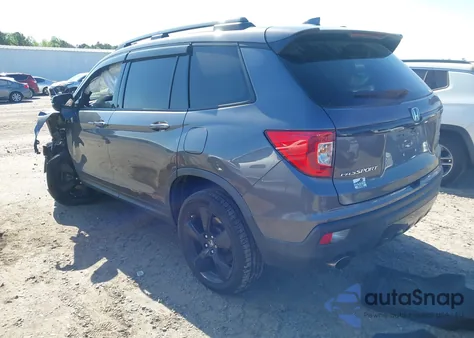 2019 Honda Passport Elite z USA, uszkodzony, nr VIN 5FNYF8H04KB004657